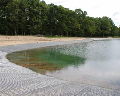 Earth retention and revegetation of slopes